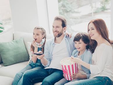 Decorate image of family watching TV