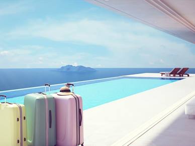 suitcases by a swimming pool